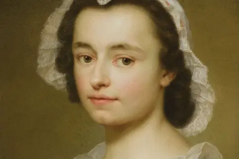 Porträt einer jungen Frau mit Haube